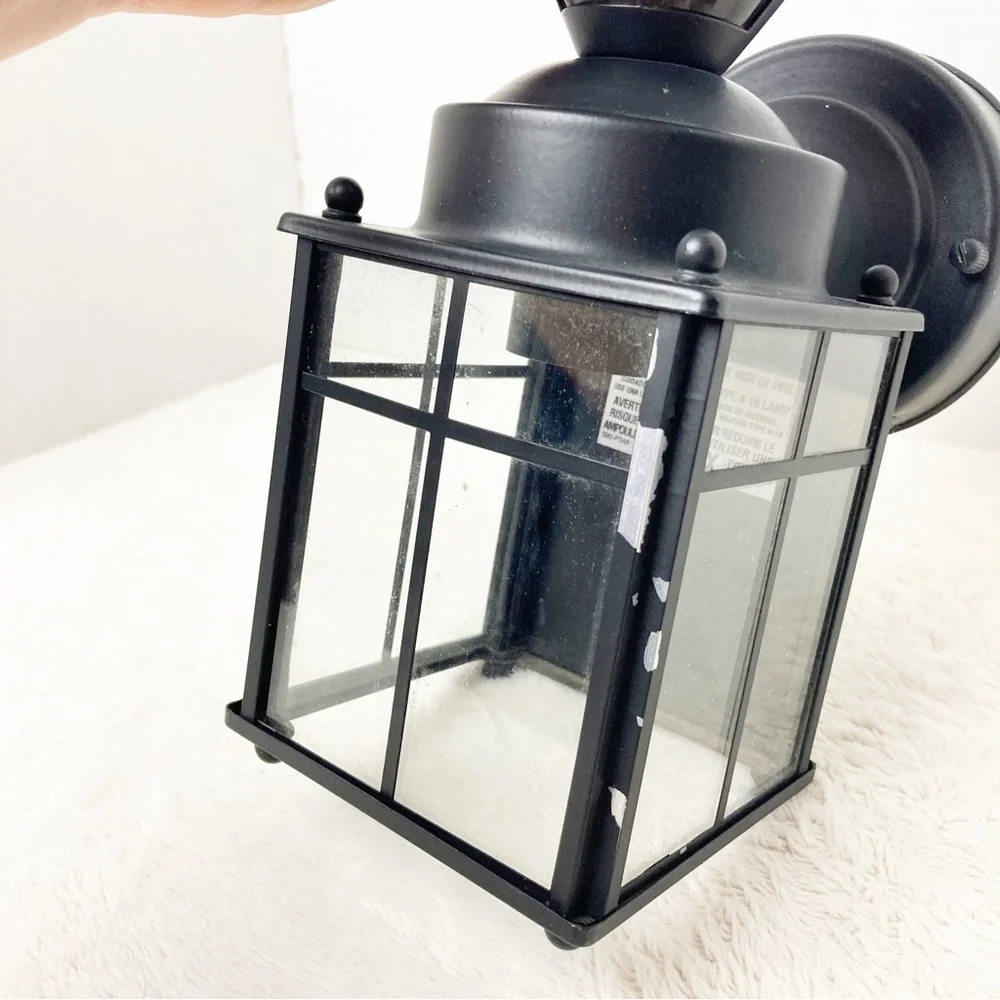 Black outdoor motion light sconce